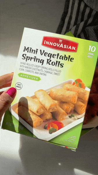 An animated gif of a social media video showing a chef preparing a bowl of crispy InnovAsian Spring Rolls to be used in Vietnamese-style lettuce wraps. Our chef crunches one at the end, looking satisfied.